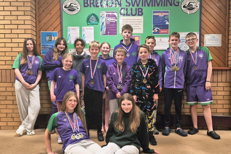 Brecon & District Swimming Club swimmers celebrate success after winning 29 medals at the Amman Valley Open Meet in Carmarthen