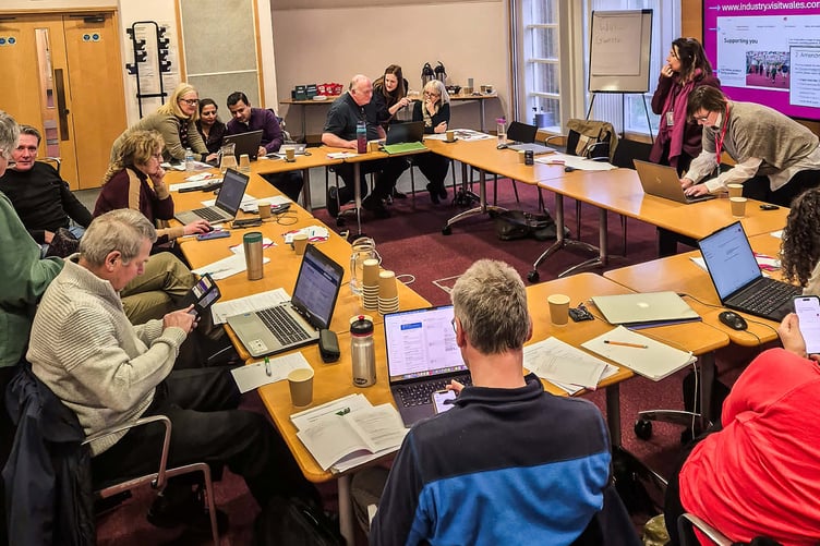 Businesspeople at one of the first AI workshop held in Swansea.