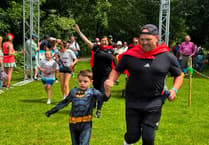 Brecon boy’s finish line moment after life-threatening illness