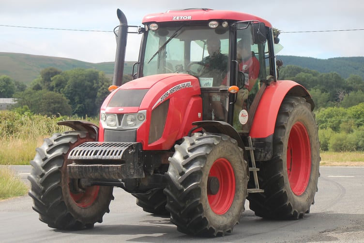 Abbeycwmhir farmer Adam Lewis and his son with their Zetor tractor