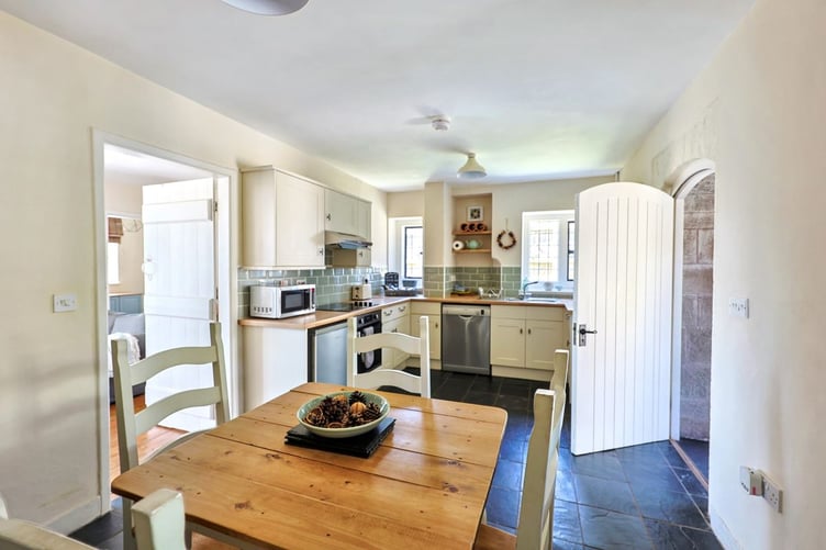 The two-bedroom cottage has been sympathetically modernised while keeping its historic charm.