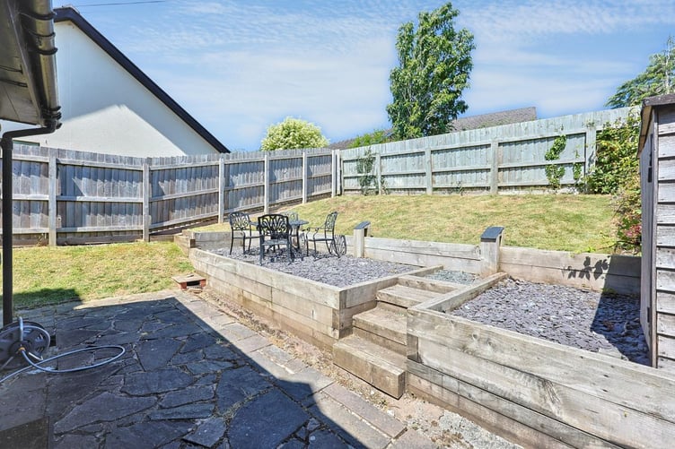The cottage has gardens to the front and side, with an enclosed rear garden