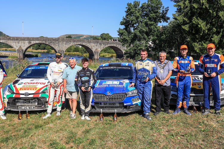 Having completed a long and dusty day of rallying, the top three crews receive their trophies from event sponsor Nicky Grist and Builth Wells Mayor Cllr Alan Waller