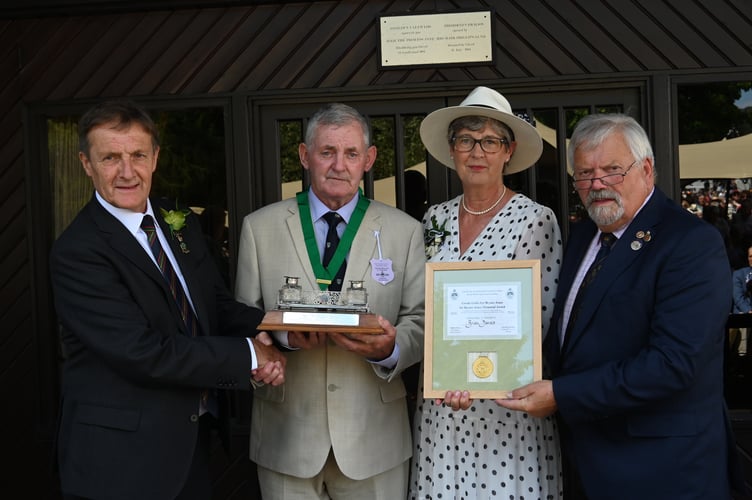 Brian Davies was presented with the Sir Bryner Jones Memorial Trophy, Medal and Certificate by Royal Welsh Agricultural Society president Gethin Havard, alongside his wife and award sponsor Gareth Roberts FRAgS