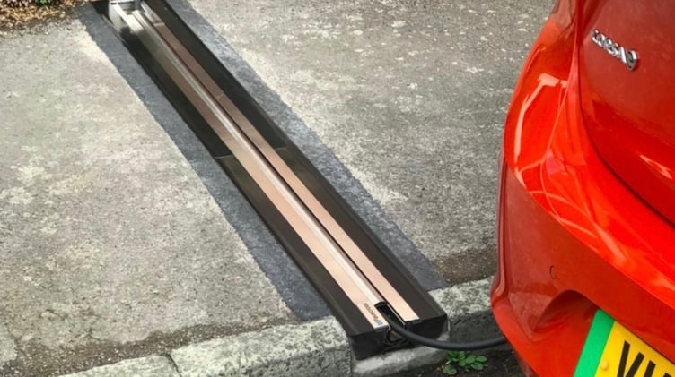An EV pavement charging gully