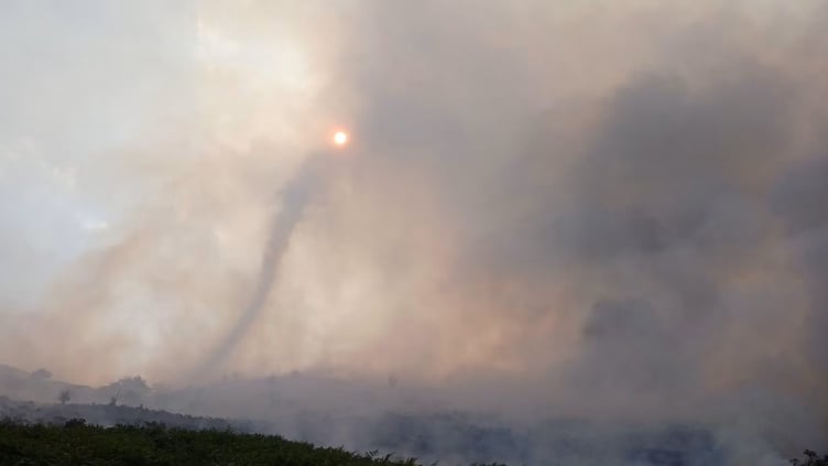 Huge plumes of smoke rise above Hanter Hill