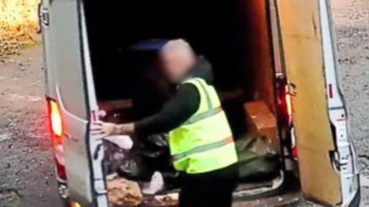 CCTV footage showing waste being dumped from the back of a silver Ford Transit van at the Global Centre of Rail Excellence site near Ystradgynlais