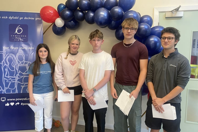 A proud moment for these Ysgol Calon Cymru learners