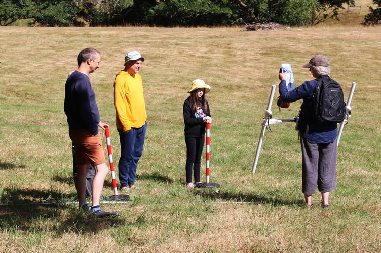 Volunteer surveyors are briefed by archaeologist Jennifer Muller