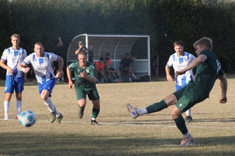 Joey Price scores from the penalty spot for Radnor Valley against Kerry