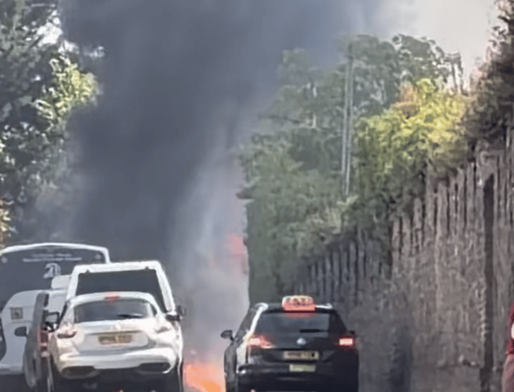 The A40 was temporarily closed through Crickhowell after a fire involving a van and a caravan
