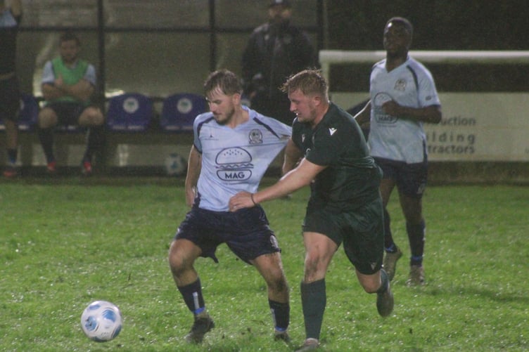 Radnor Valley booked their place in the second round of the Welsh Cup with a 3-2 win over Seven Sisters Onllwyn in a rain-soaked clash
