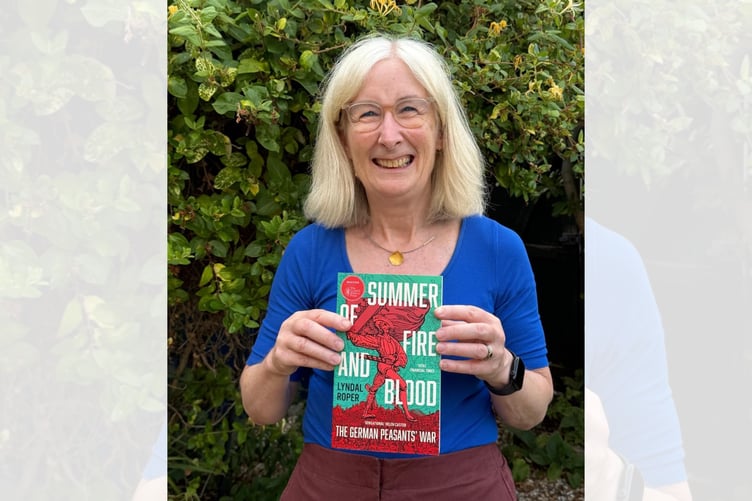 Lyndal Roper with her book Summer of Fire and Blood: The German Peasants’ War