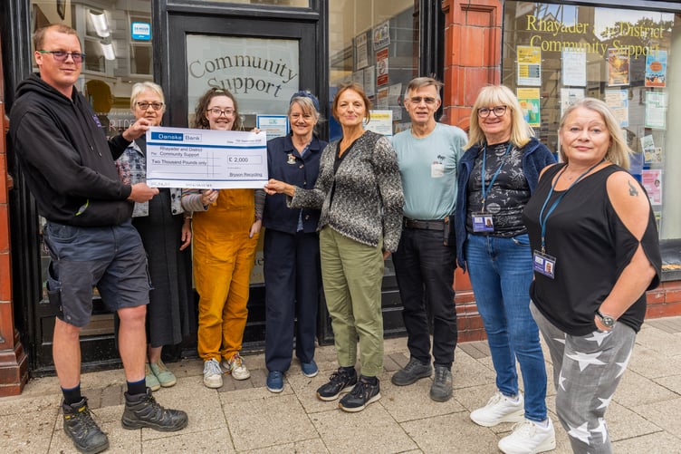 Left to right: Joe Williams of Bryson Recycling; Trish Buchan, joint chair of RDCS; Sarah Rowe, volunteer co-ordinator at RDCS; Jax Davies, joint chair of RDCS; Cllr Angela Davies, Powys County Council; John Buchan, volunteer at RDCS; Linda Knox, transport assistant and volunteer at RDCS; and Ali Thomas, deputy manager and transport manager at RDCS