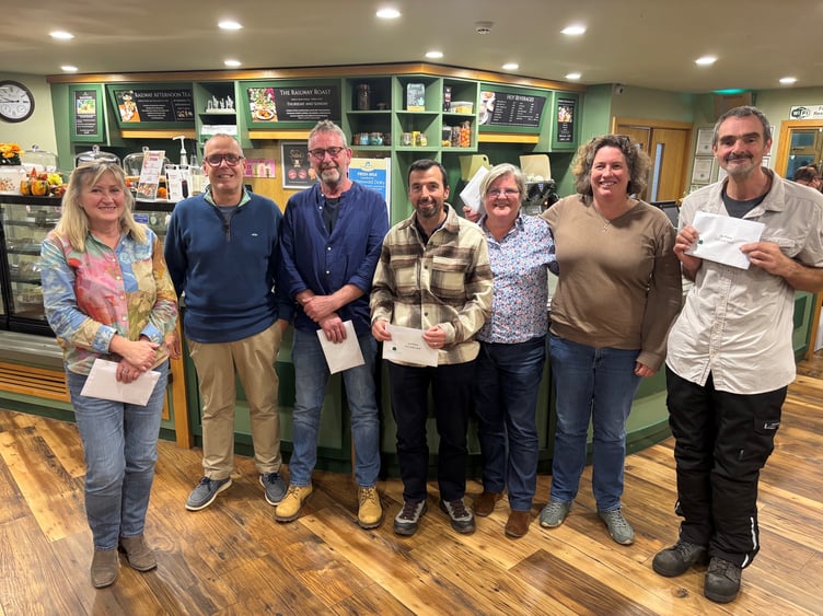 The winners of the Macmillan Quiz & Curry Night at the Old Railway Line Garden Centre
