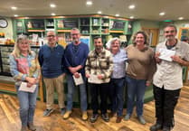 Garden centre raises more than £1,500 for Macmillan