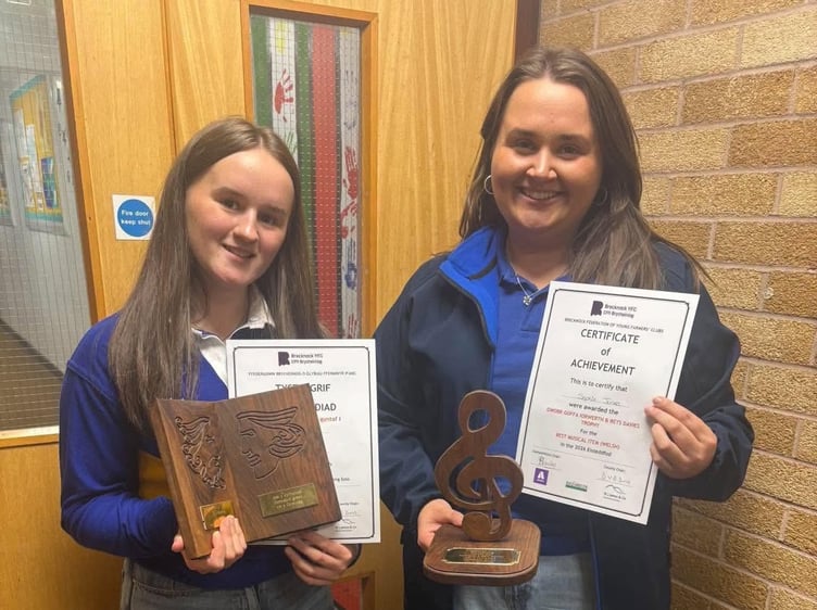 Sophie and Anest with their awards for the best musical and best literary items at the Brecknock County Eisteddfod