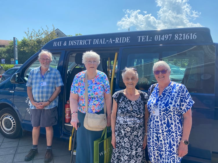 Left to right: Rob, volunteer driver; Barbara and Hazel, passengers; and Joy, Shopping Buddy