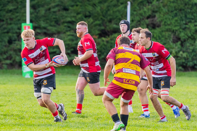 Luke Evans makes one of his many carries during an outstanding performance for Brecon