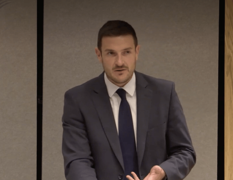 James Evans, MS for Brycheiniog Tawe Nedd, speaking in the Senedd